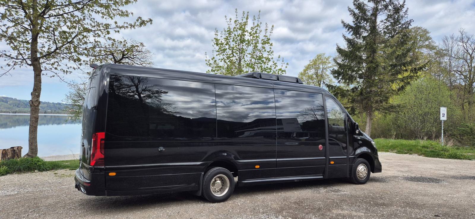 VIP Sprinter, rear view, on a lakeshore